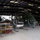 Schweizer 269C-1 TH-55 Osage and Mil Mi-2T Hoplite Bord 212 RSideFront CWAM 8Oct2011 (14630918215)