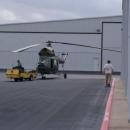 Mil Mi-2T Hoplite Bord 211 Towed into hangar Wall CWAM 8Oct2011 (14628813204)